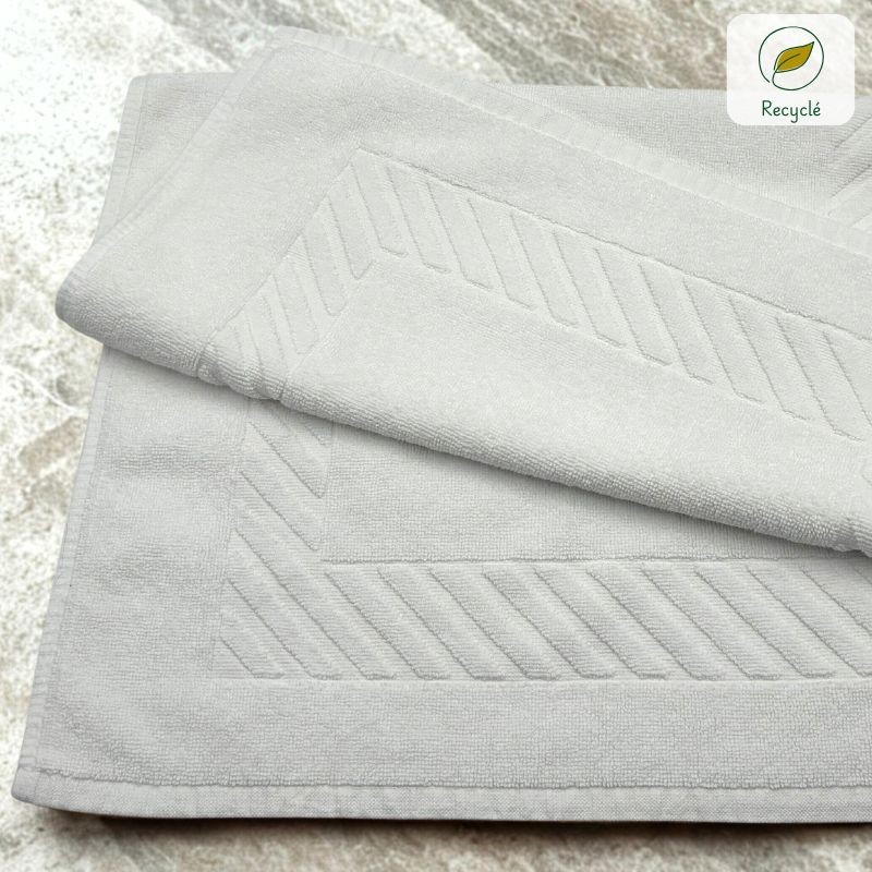 Tapis blanc 45x70 cm écoresponsable – Art du Linge pour hôtels, gîtes et instituts - lot de 4 Tapis blanc 45x70 cm écoresponsable – Art du Linge pour hôtels, gîtes et instituts - lot de 4